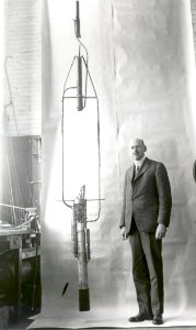Robert Goddard With His Double Acting Engine Rocket In 1925 photo