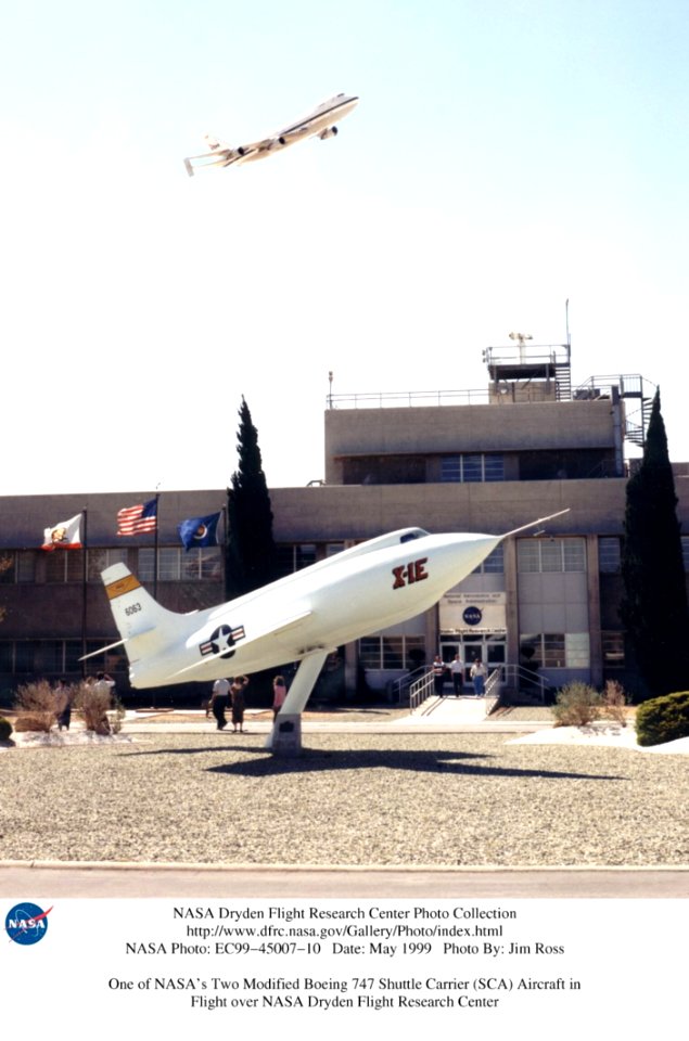 One Of NASAs Boeing 747 Shuttle Carrier Aircraft Flies Over The Dryden Flight Research Center