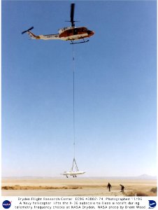 X-36 Carried Aloft By Helicopter During Radio And Telemetry Tests photo