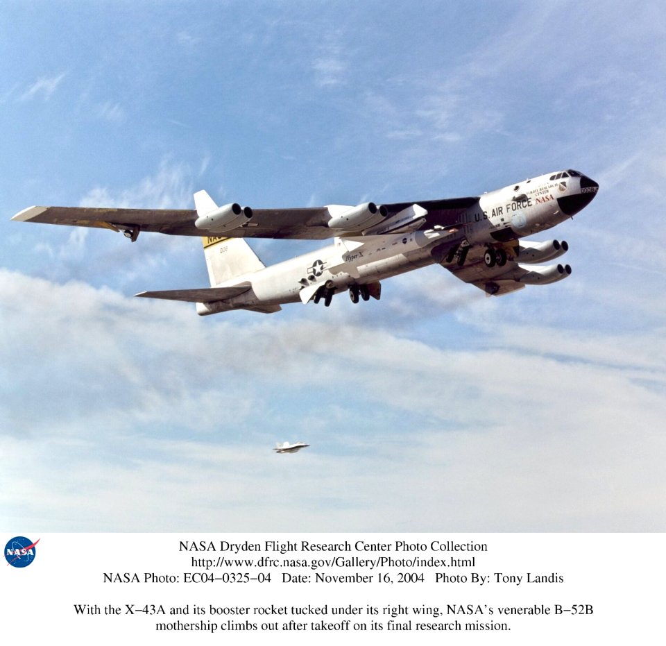 X-43A And Its Booster Rocket Tucked Under B-52B Wing