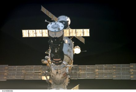 Soyuz FGB And The SM As Discovery Approaches For Docking During STS-121