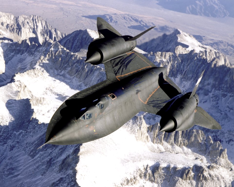 SR-71 Over Snow Capped Mountains