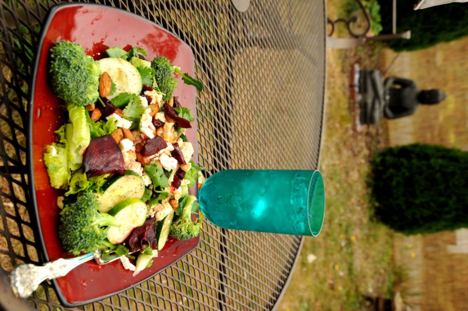 Healthy Eating Summer Salad With A Tumbler Of Sparkling Water Blessed Buddha Statue Outside In The Yard Broadview Seattle Wa