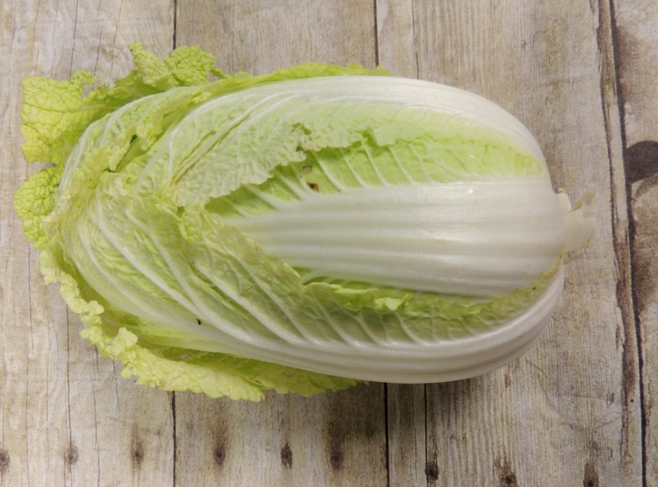 Napa Cabbage On Wood