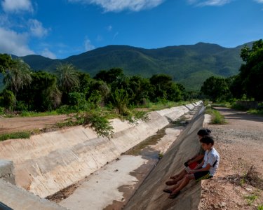 Children playing in a ravine