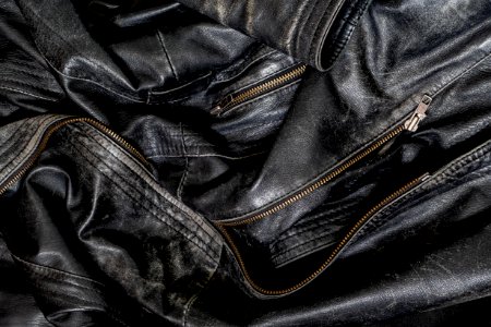 Black worn leather jacket detail 1 photo