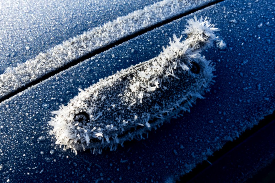 Car radio antenna on Mazda 323 compacted