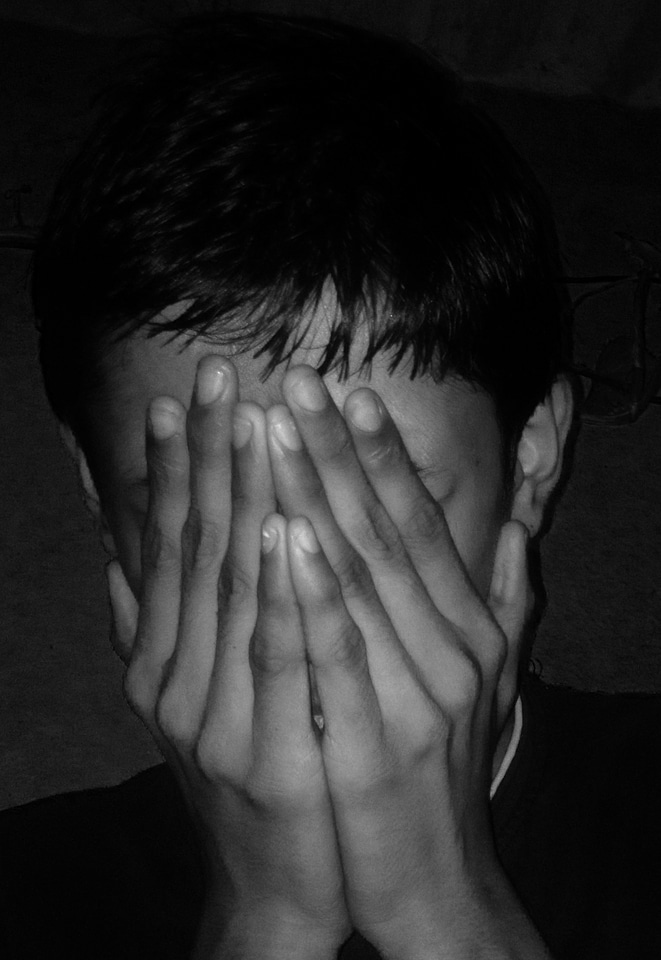 Hiding face scared photo
