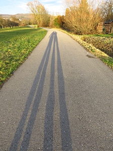 Human long shadow sun photo