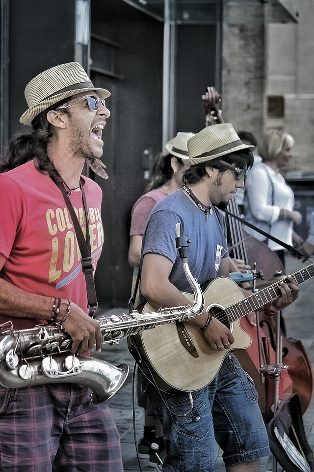 Guitar saxophone street musicians