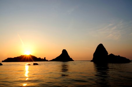Islands of the Cyclops at Dawn Sicily Italy - Creative Commons by gnuckx