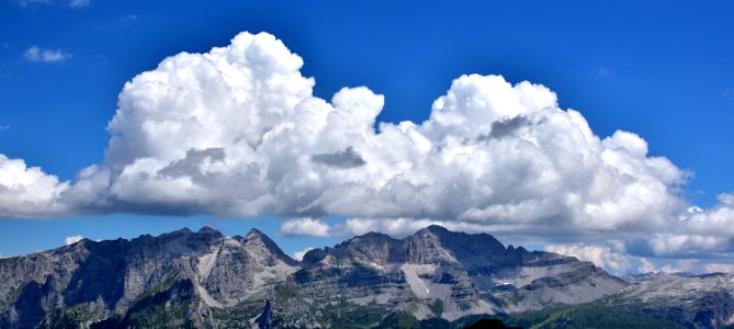 Clouds over the dolomites photo