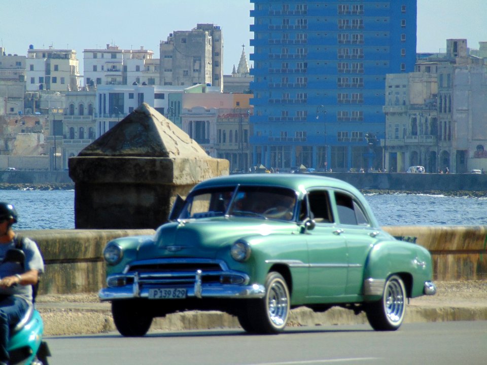 Havana. Seafront with green almendrón