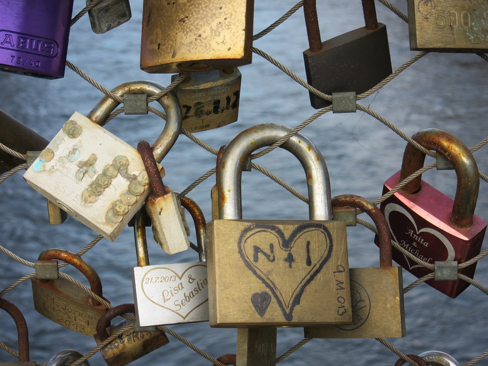 Promise padlocks bridge railing