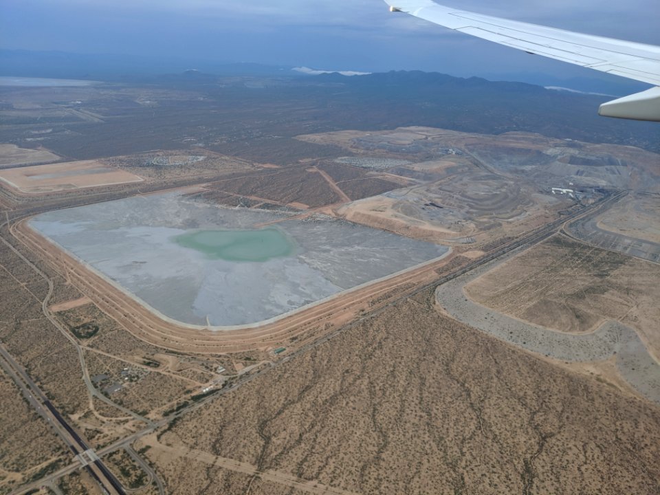 Mine and tailings sound of Tucson, disturbingly close to housing.