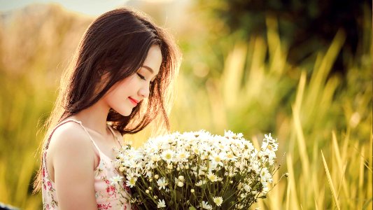 asian girl with flower