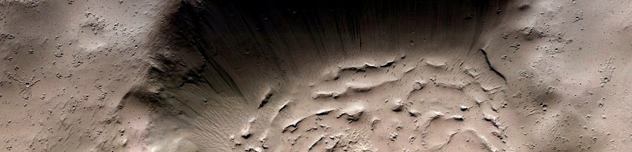 Mars - Flow Features and Crater on Tombaugh Crater Rim photo
