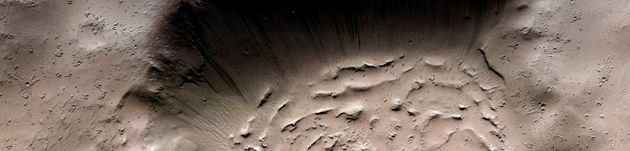Mars - Flow Features and Crater on Tombaugh Crater Rim
