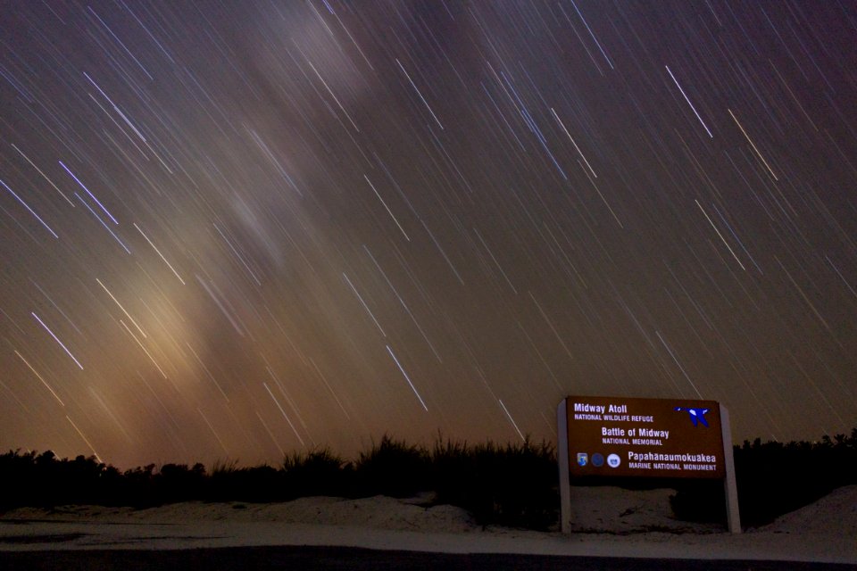 Ultra-long exposure of the Milky Way over the Midway sign by the cargo pier (attempt #2)