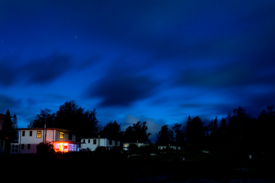 Officers' Row lit by the light of the full moon