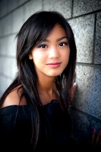 A beautiful girl in her black dress photo