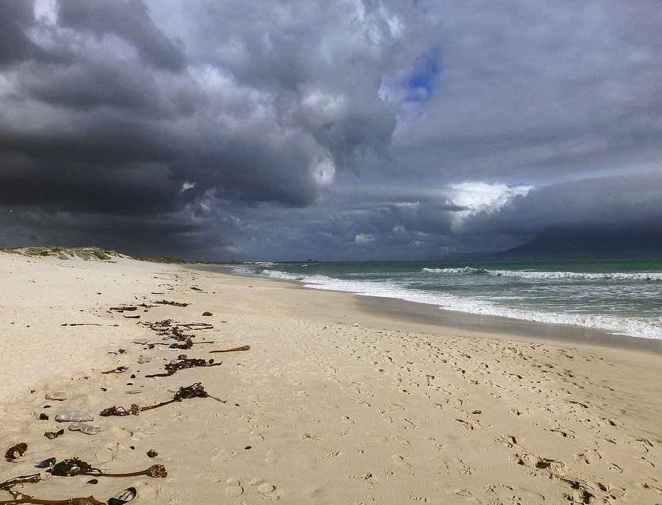 Gloomy sand beach wave