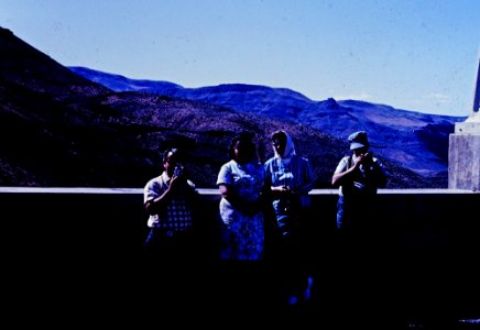 Freeman and Patty Strait with two tourists at Buffalo Bill Dam, WY