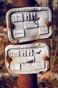 Rusty water pipe sign photo