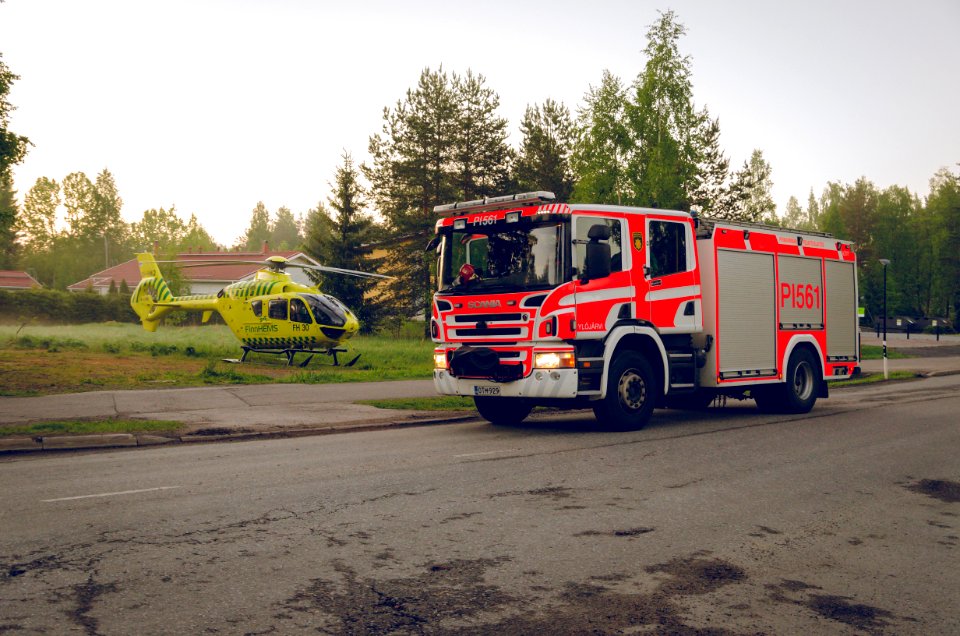 Medical helicopter and firetruck
