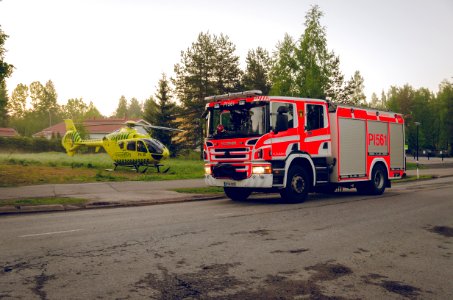 Medical helicopter and firetruck