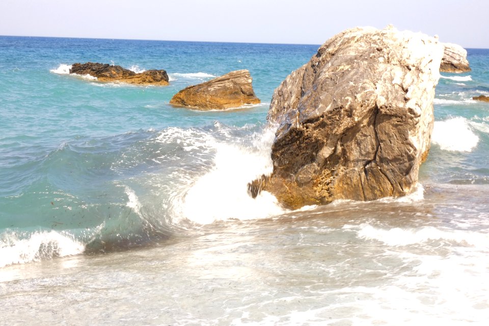 Tide hitting a rock
