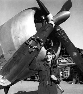 Lt Edwin Wright with his damaged P-47 Thunderbolt at St Truiden Belgium October 1944.