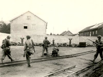 This picture shows an execution of SS troops in a coal yard in the area of Dachau concentration camp during the liberation of the camp April 29th 1945.