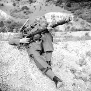 A member of the Home Guard demonstrates a rifle equipped to fire a No. 68 anti-tank grenade near Dorking, August 3rd 1942.