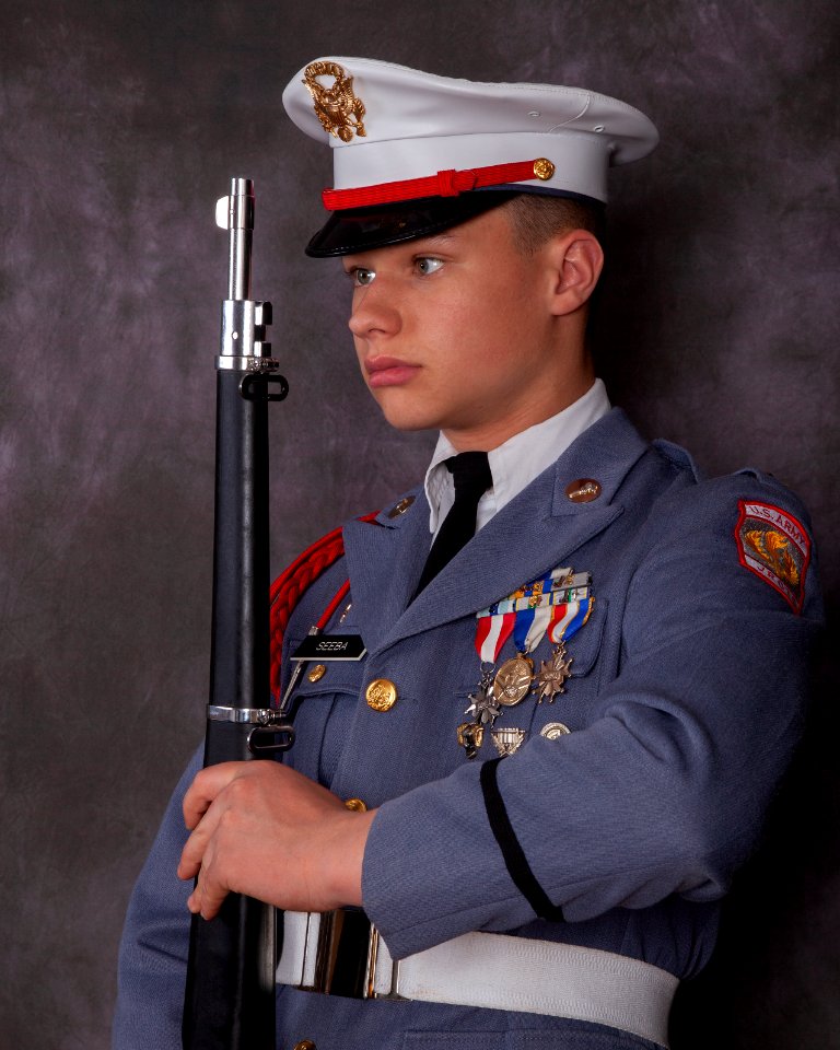 mike with rifle