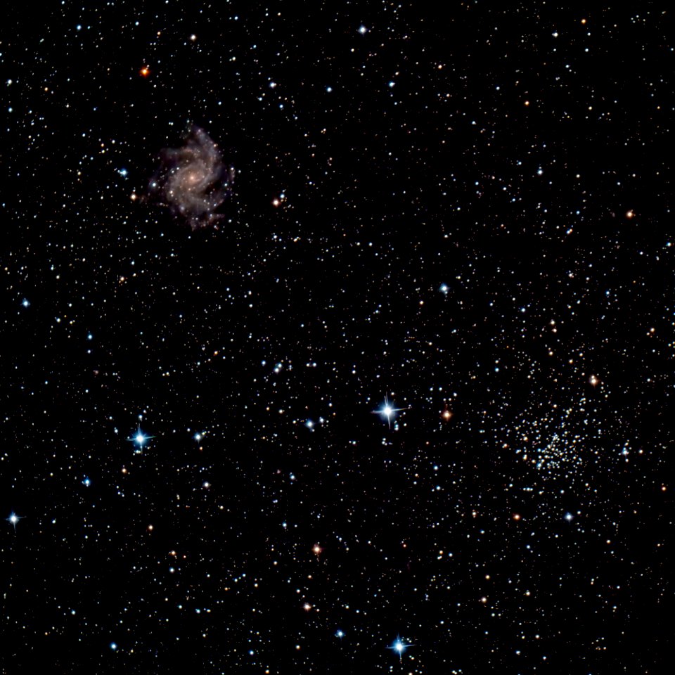 The Fireworks Galaxy and an Open Cluster