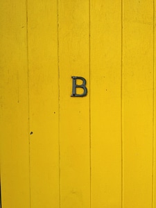 Yellow wood sign