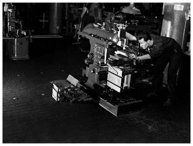 "Operating a metal shaper"