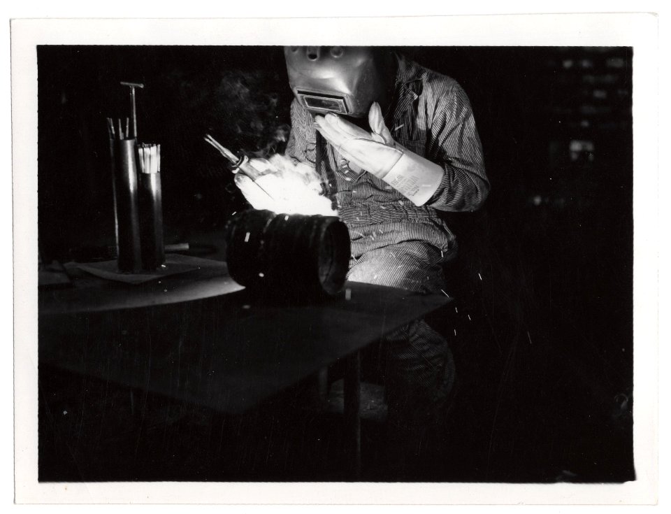 "A Negro youth welding"