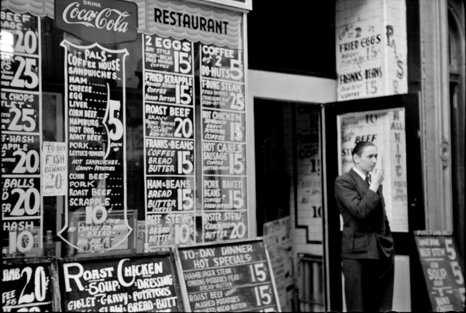 Potluck Potpourri: Baltimore, Maryland. Restaurant sign on Baltimore street. April 1939