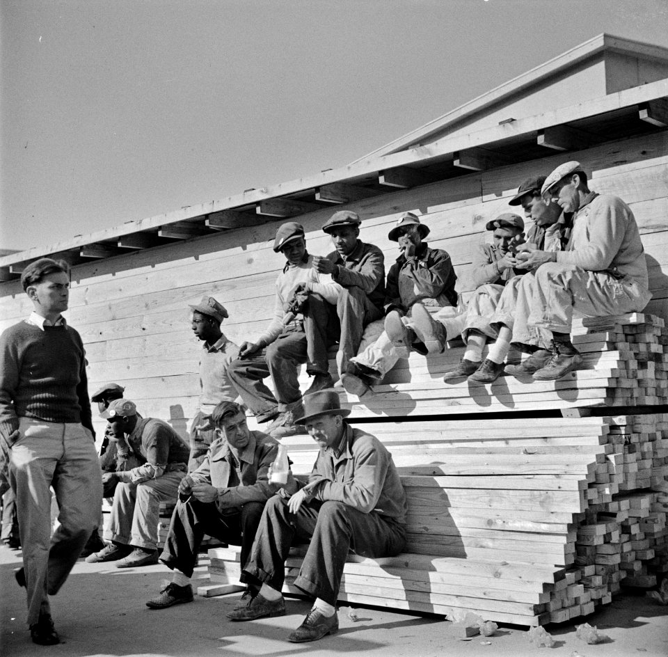 Lunch Break: Workmen at lunch hour on emergency office space construction job. Washington, D.C., 1941.