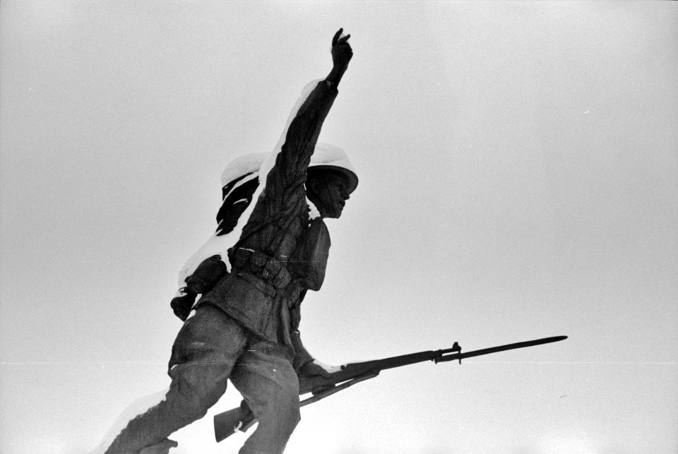 The Winter Soldier: World War statue in a park after a snowstorm. Chillicothe, Ohio, February 1940.