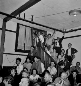 Packed House: Listening to the speaker at the Conference to Aid Agricultural Organization during the cotton strike (Steinbeck Committee). Bakersfield, Kern County, California. November 1938.
