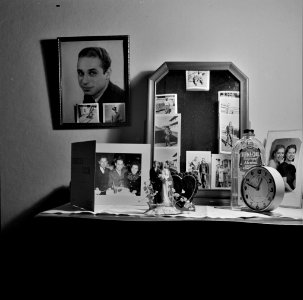 A Dream for Two: Pictures of a husband in the service decorate the dresser and mirror of this boardinghouse resident. Washington, D.C., January 1943.