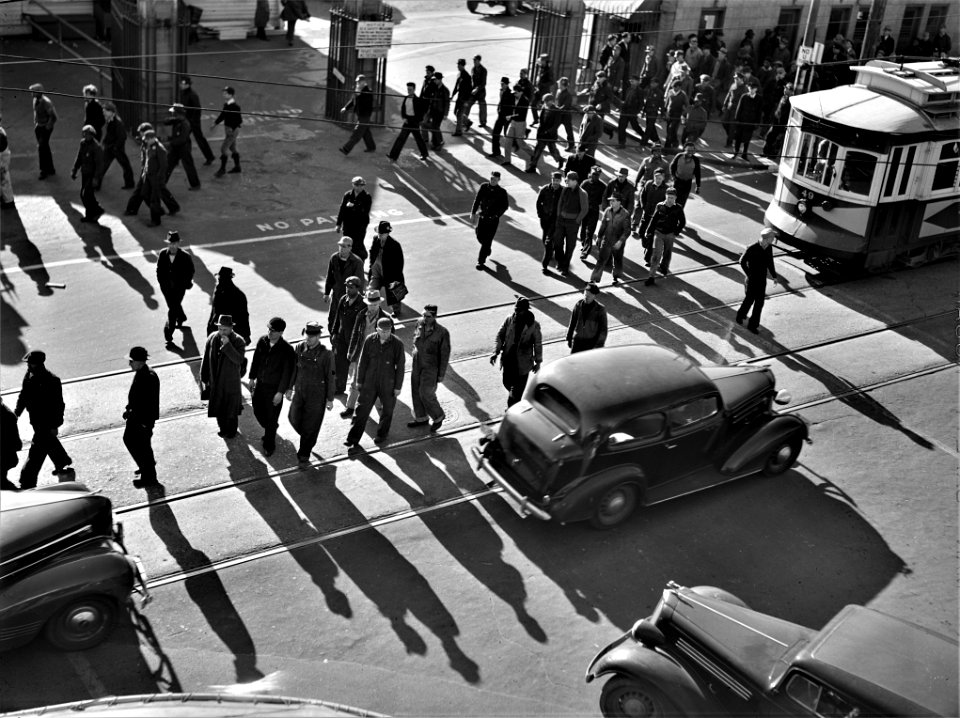 Hear That Whistle: Shipyard employees getting out of work at 4 p.m. Newport News, Virginia, March 1941.