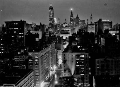 Night and the City: A rainy evening in New York City, looking north from University Place, September 1939.
