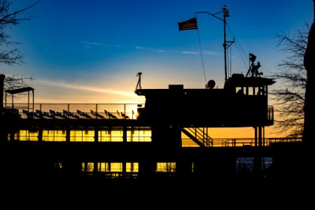 "Miss Ellis Island" boat at sunset. photo