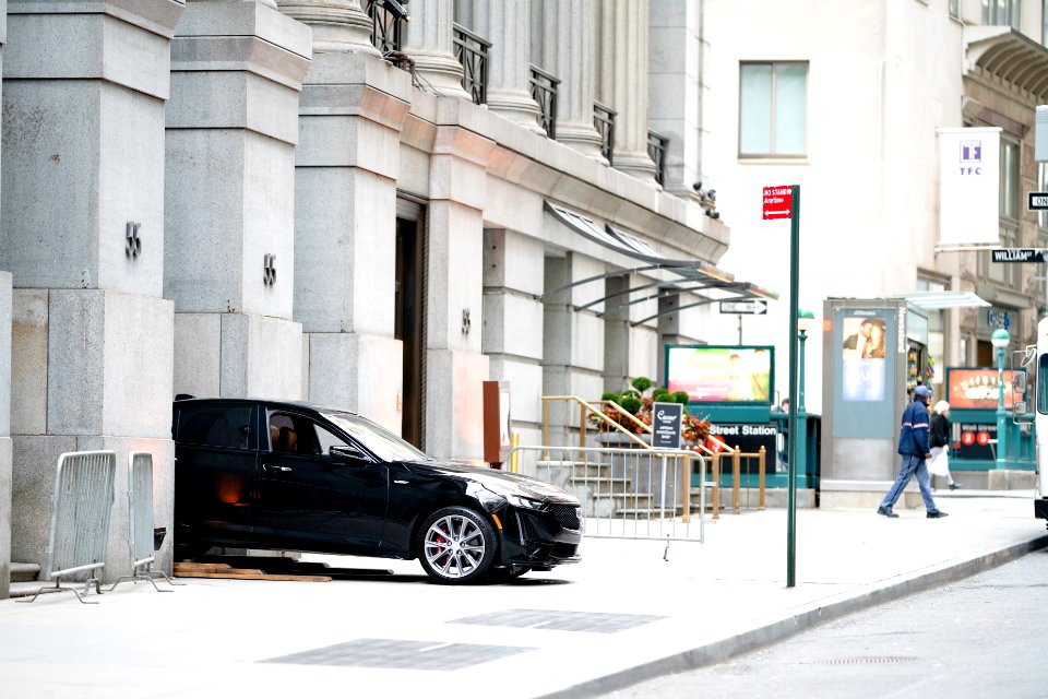 Unusual, a Cadillac sticking out of Cipriani's entrance at 55 Wall Street