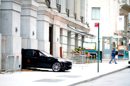 Unusual, a Cadillac sticking out of Cipriani's entrance at 55 Wall Street photo