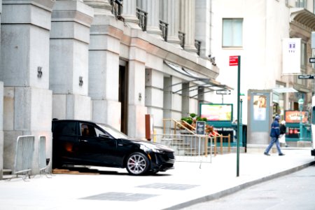 Unusual, a Cadillac sticking out of Cipriani's entrance at 55 Wall Street